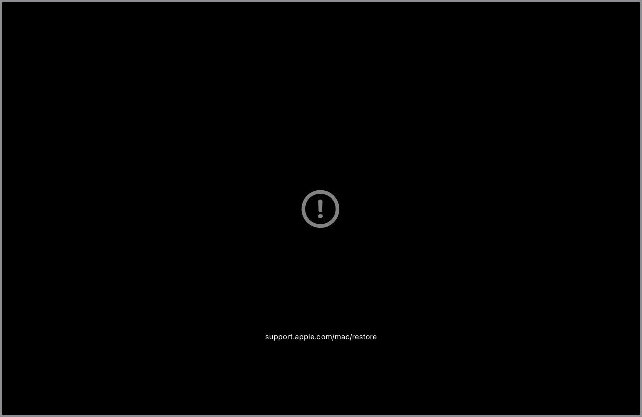 Dấu chấm than trong vòng tròn khi Macbook không khởi động được.