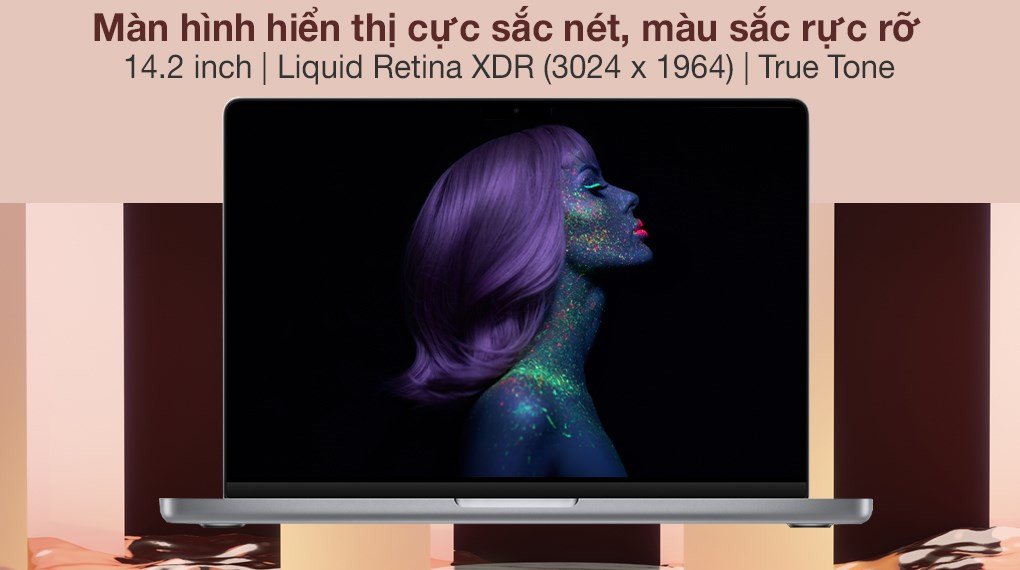Hai chiếc MacBook Pro và MacBook Air đặt cạnh nhau hiển thị hình ảnh với màu sắc sống động