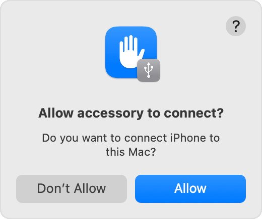 Màn hình yêu cầu cấp quyền kết nối phụ kiện iPhone với MacBook để chuyển ảnh