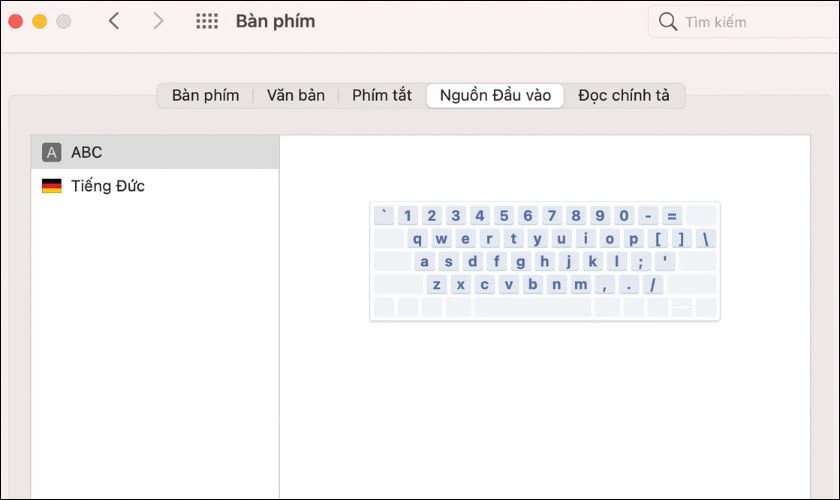 Thanh menu hiển thị lựa chọn ngôn ngữ bàn phím tiếng Đức và tiếng Việt trên MacBook